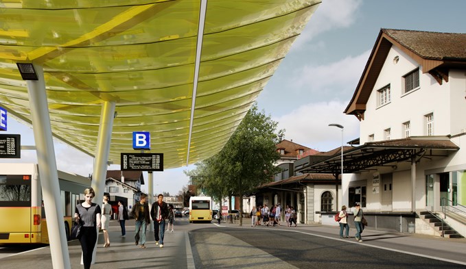 So soll der neue Bushof und der verkehrsberuhigte Bahnhofplatz dereinst aussehen: Blick vom neue Busperron gen Bahnhofgebäude, «Wyhof» und Landi. (Visualisierung zVg)